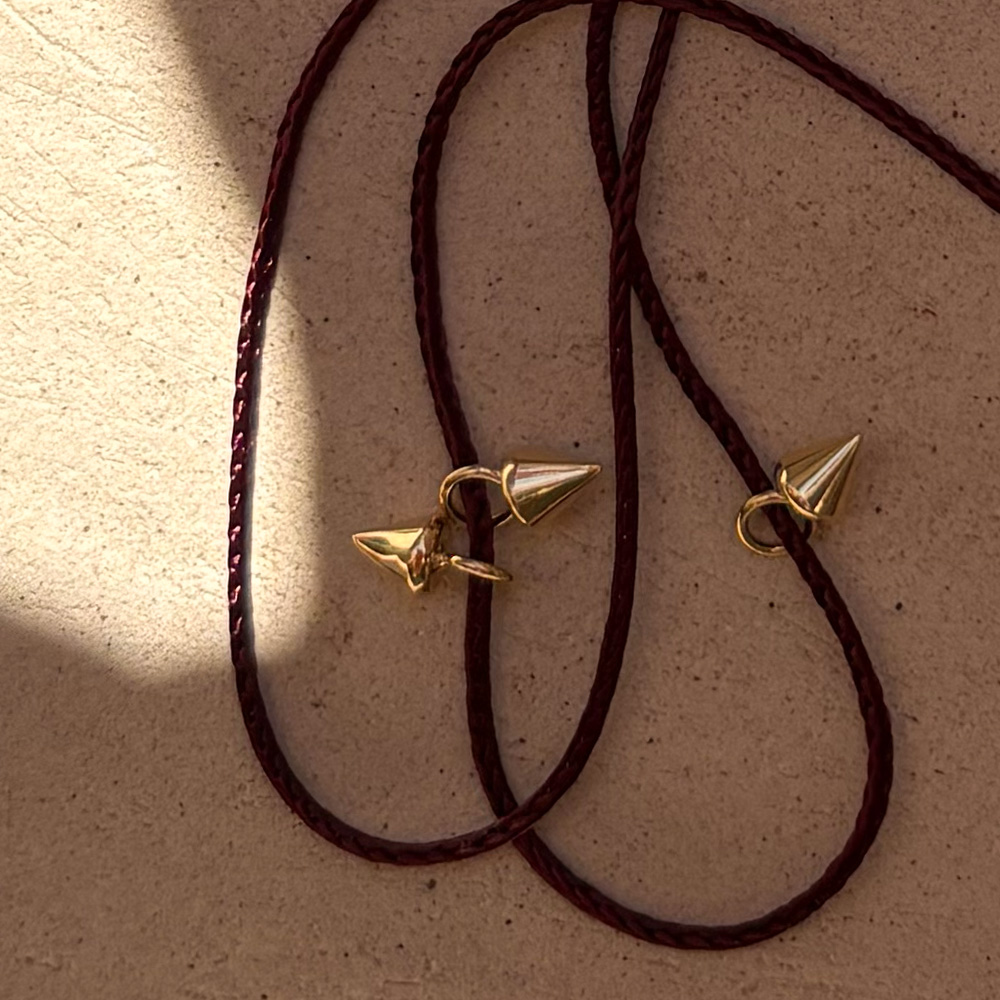 collana cordino borchie